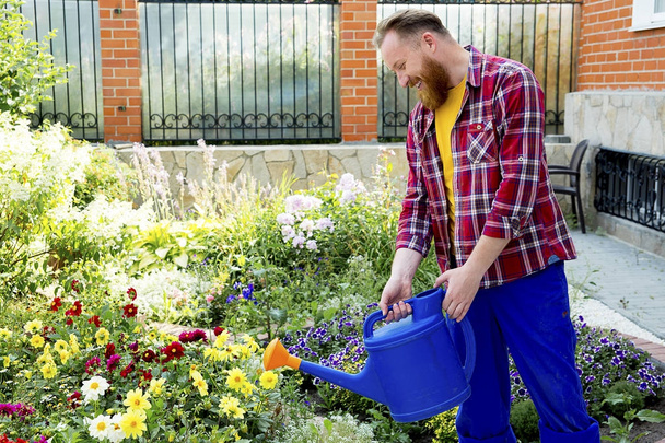 Happy man gardening - Фото, изображение