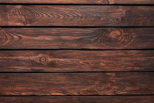 Texture of boards of dark old brown wood - Foto, imagen