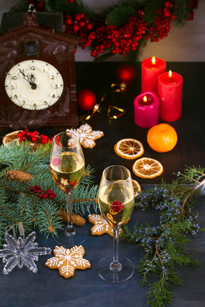 Champagne glasses in holiday setting. Christmas and New Year celebration with champagne - Foto, immagini