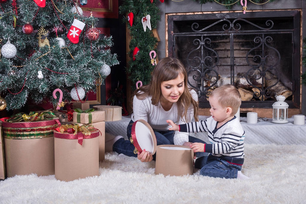 Happy mother and son at Christmas time - Photo, image