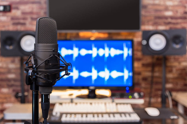 condenser microphone in digital recording, broadcasting studio background - Fotó, kép