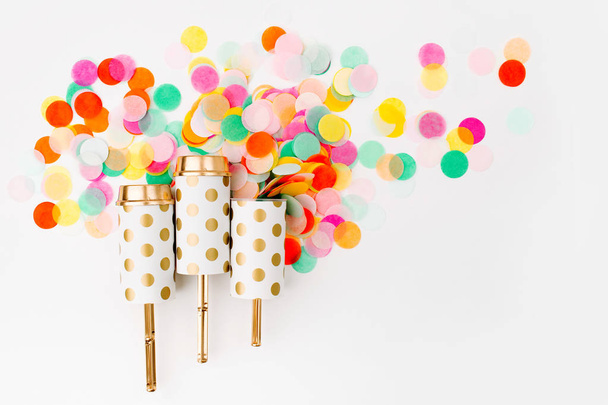 Push-pop petards and colorful confetti - Fotografie, Obrázek