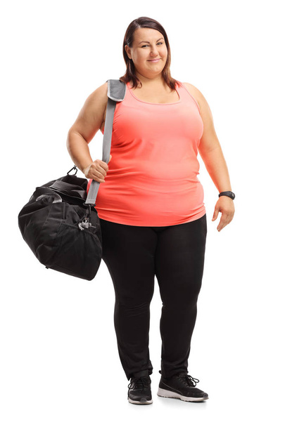 Overweight girl with a sports bag - Zdjęcie, obraz