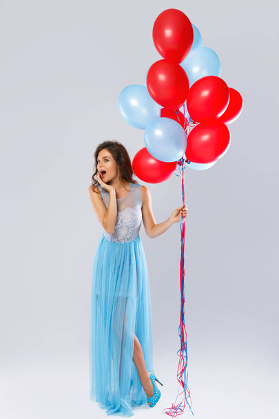 Young woman with colorful balloons - Foto, Bild