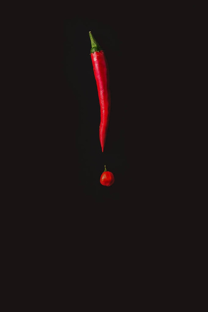 exclamation point made with chillies on dark background - Photo, Image