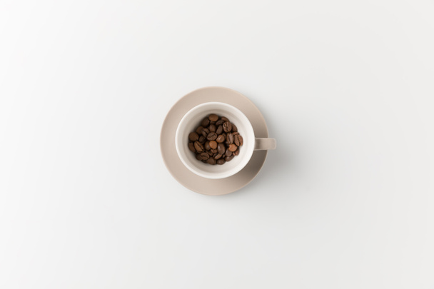 Taza con granos de café - Foto, Imagen