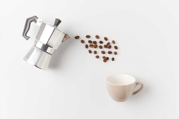 coffee beans pouring from pot - Fotoğraf, Görsel