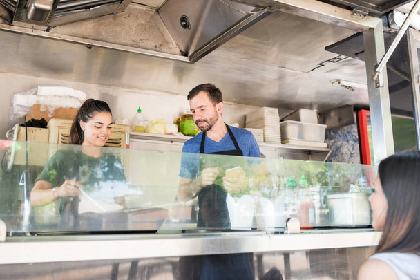 Workers in a food truck - Photo, Image