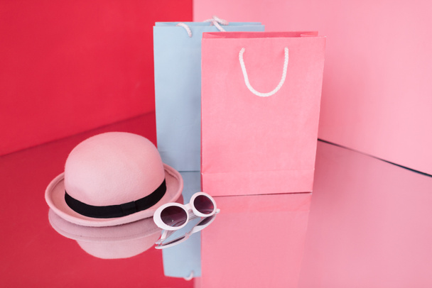 shopping bags, hat and sunglasses - Photo, Image