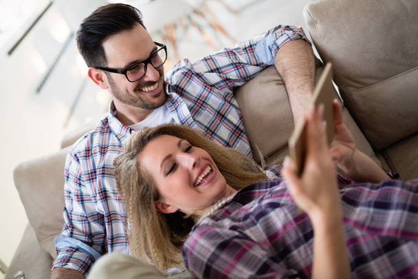 Relaxed couple or friends using tablet - Photo, Image