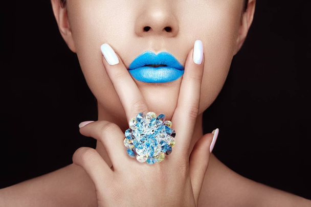 Beauty girl face close up with blue lips - Photo, image