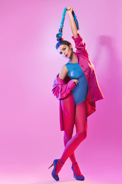 Stylish woman in colorful clothes - Valokuva, kuva
