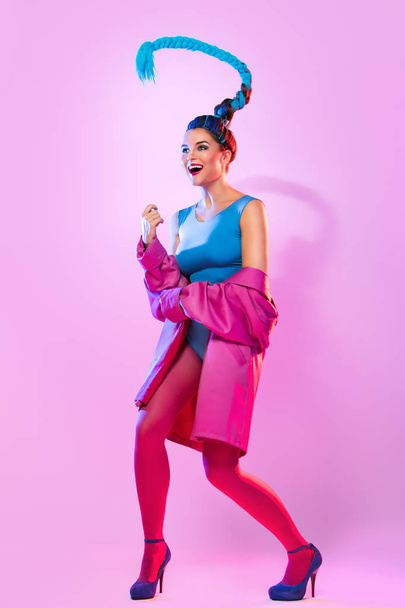 Stylish woman in colorful clothes - Фото, зображення