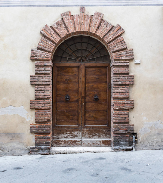 Massive wooden doors typical of southern Italy - Photo, image