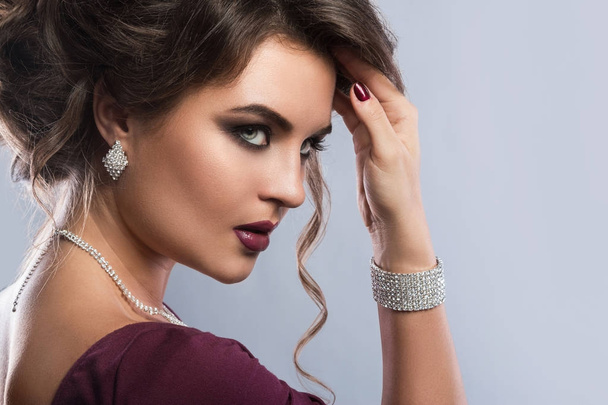 woman wearing beautiful jewelry - Фото, изображение