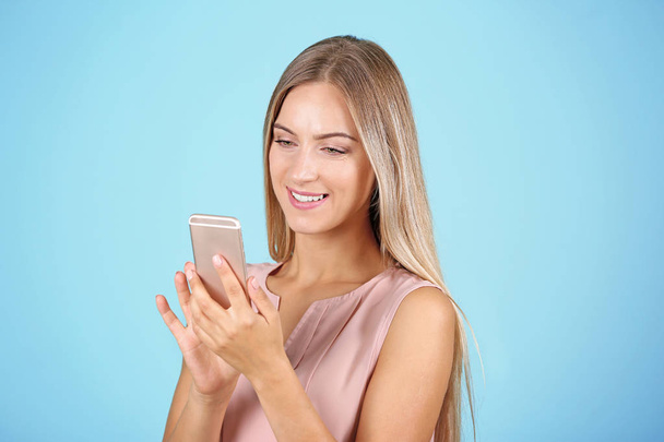 Young woman using smartphone - Photo, image