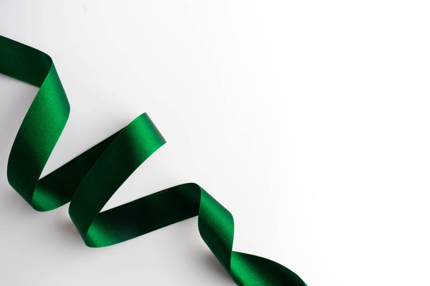 Green bow ribbon satin texture isolated on white  - Foto, immagini