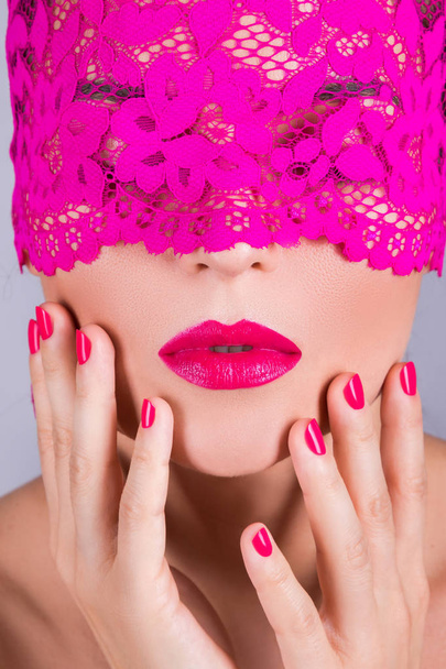 woman with elegant pink blindfold - 写真・画像
