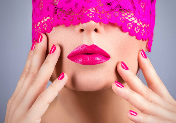 woman with elegant pink blindfold - Photo, Image