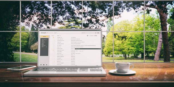 Los correos electrónicos en la pantalla de un ordenador portátil aislado en un escritorio de oficina. ilustración 3d
 - Foto, imagen