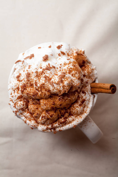 Cup of cocoa with whipped cream - Fotó, kép