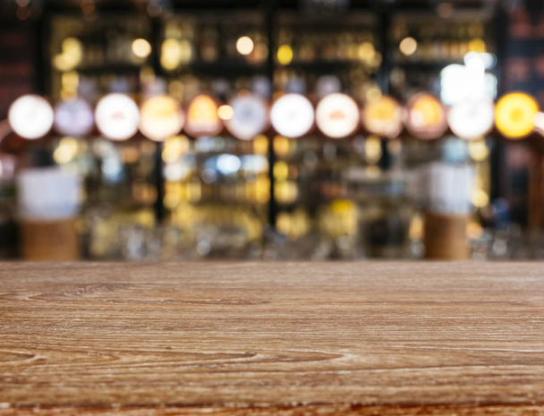 Table Top wooden Counter Blur Bar Beer pub background - Photo, Image