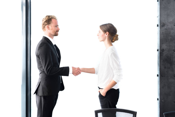 handshake of businessman and businesswoman - Zdjęcie, obraz