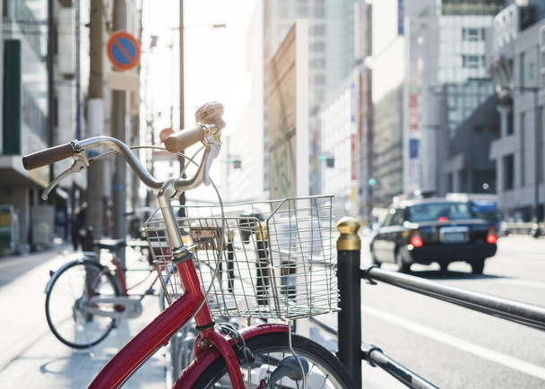 Bicycle parking street with car Transportation Urban lifestyle Japan city - Zdjęcie, obraz