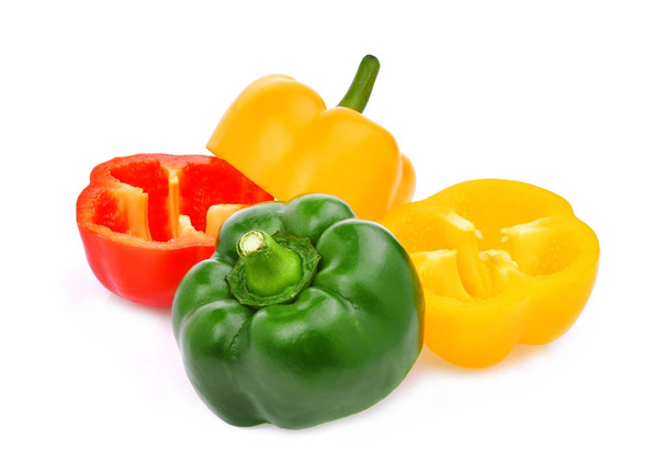 half cut of yellow,red,green, sweet bell pepper or capsicum isol - Fotó, kép
