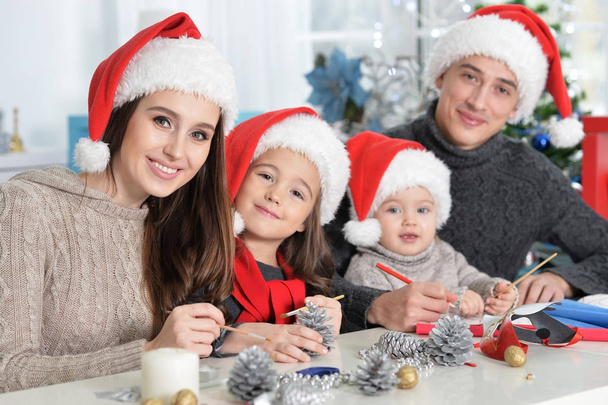 Family preparing for Christmas - Φωτογραφία, εικόνα