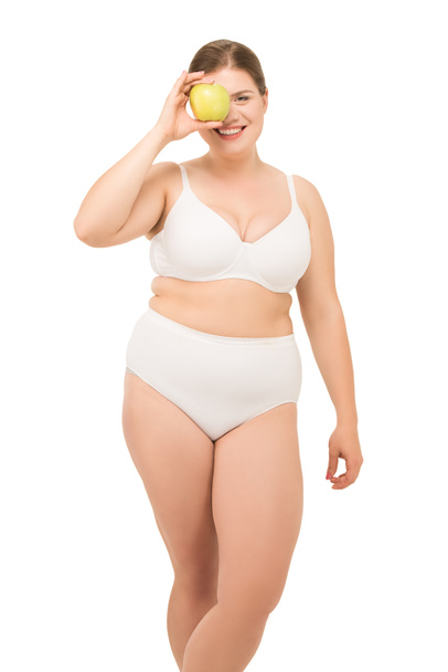 Fat woman with apple - Zdjęcie, obraz