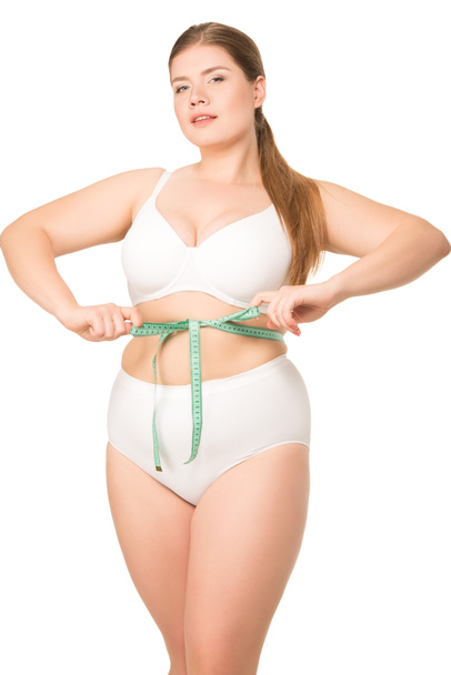 Fat woman measuring waist - Photo, Image