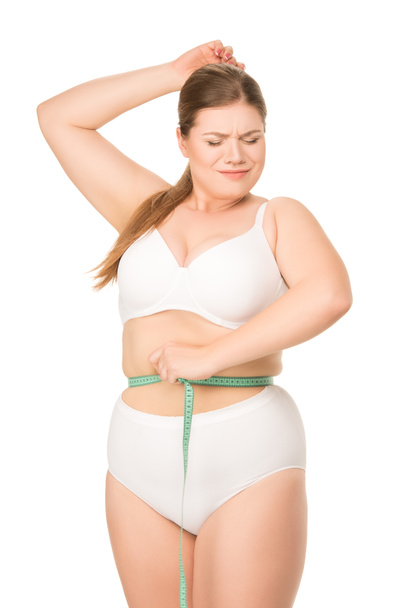 Mujer midiendo cintura
 - Foto, Imagen