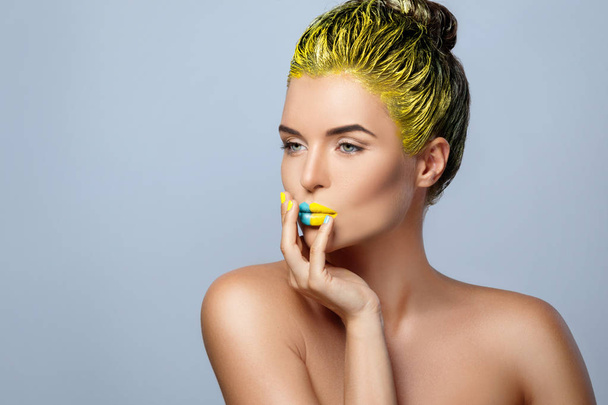 Beautiful woman with yellow hair   - Valokuva, kuva