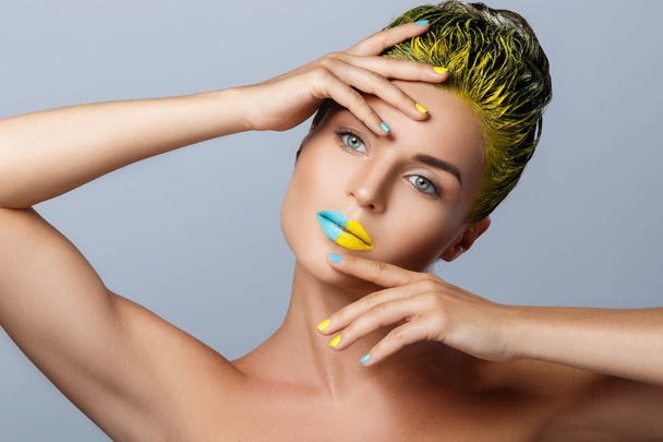 Beautiful woman with yellow hair   - Fotografie, Obrázek