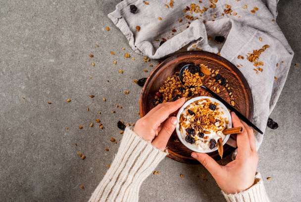 Ideas for an autumn winter breakfast. Spicy yoghurt with granola - Фото, зображення