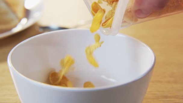 Putting Corn Flakes Into a Bowl - Video
