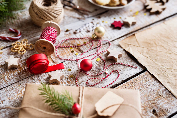Christmas composition on a wooden background. - Фото, изображение