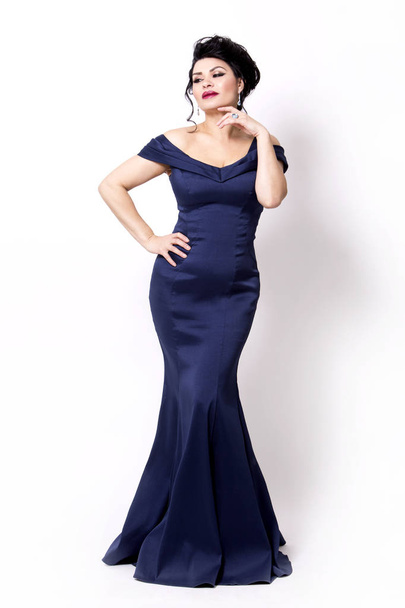 brunette wearing navy long evening gown - Photo, image