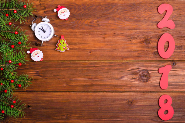 Christmas background and inscription 2018 on a wooden table, top - 写真・画像
