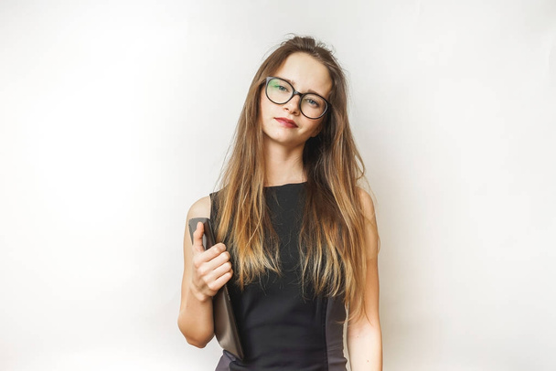 Smiling office woman with tablet,in glasses and a black trendy dress - Foto, Bild