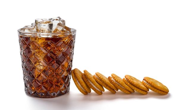 cup of iced cola and sandwich biscuits on white background with clipping path - Photo, Image