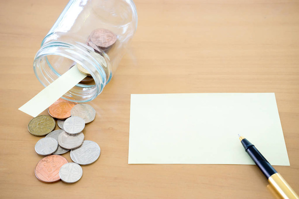 Money jar with U.S. currency represents savings, donations conce - Φωτογραφία, εικόνα