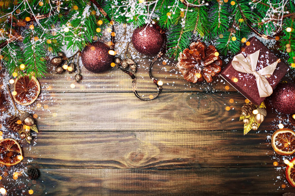 Christmas winter background, a table decorated with fir branches and decorations. Happy New Year. Merry Christmas. - Photo, Image