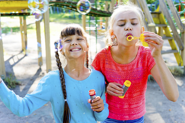 Kids with soap bubbles - Photo, Image