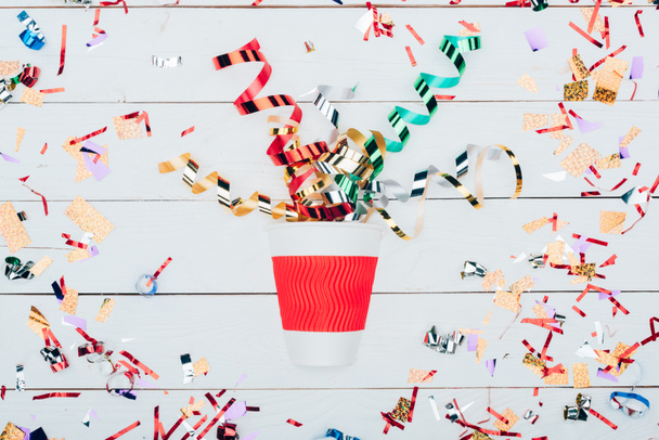 confetti spilling out of paper cup - Photo, Image