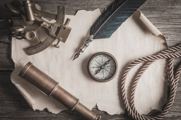 compass,sextant and spyglass on the timber - Fotografie, Obrázek