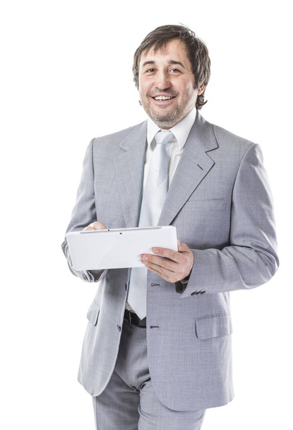 portrait of confident businessman with digital tablet on white background - Foto, immagini