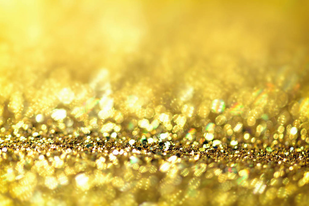 golden glitter texture Colorfull Blurred abstract background  - Photo, image