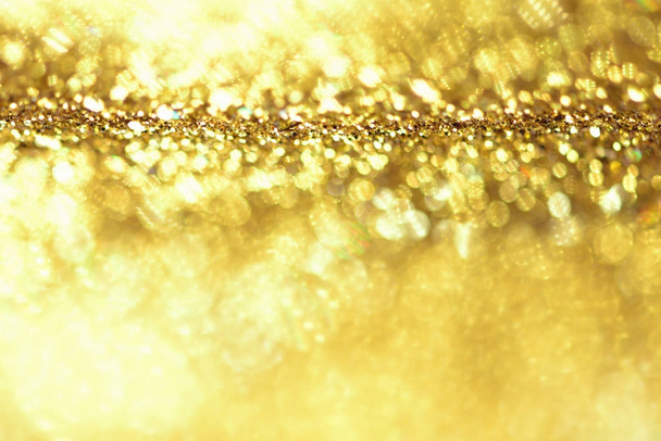 golden glitter texture Colorfull Blurred abstract background  - Фото, изображение
